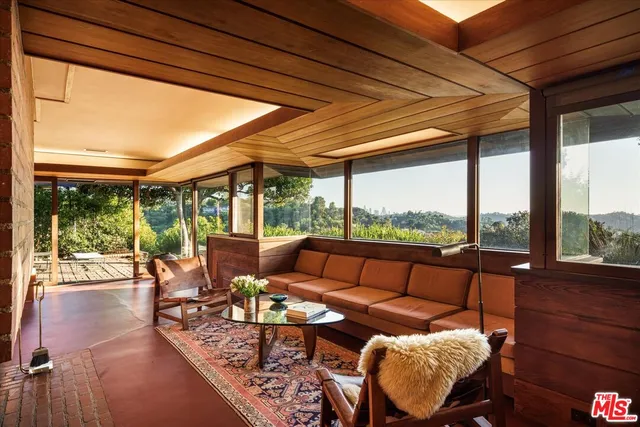 a outdoor living space with furniture and garden view