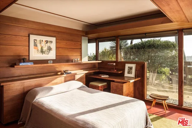 a view of living room with a table and chairs