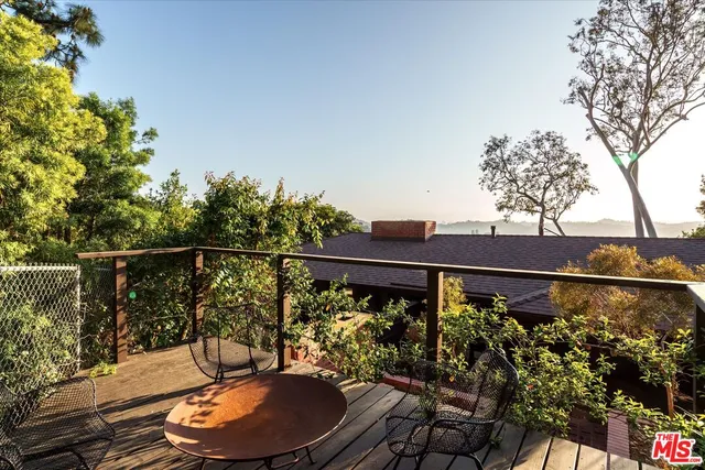 a kitchen with lots of appliances and cabinets