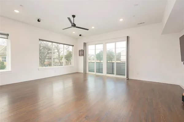 a view of kitchen with furniture and wooden floor