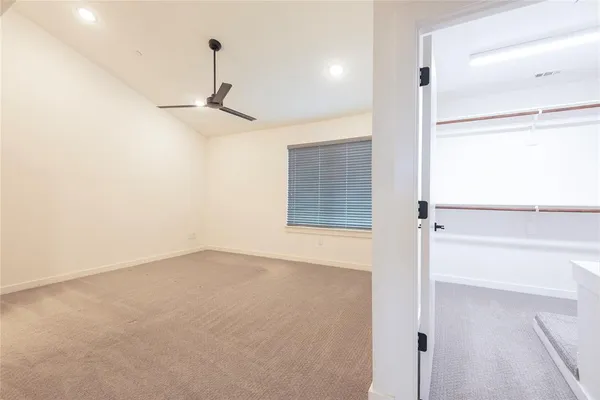 a bathroom with double vanity sinks and a mirror