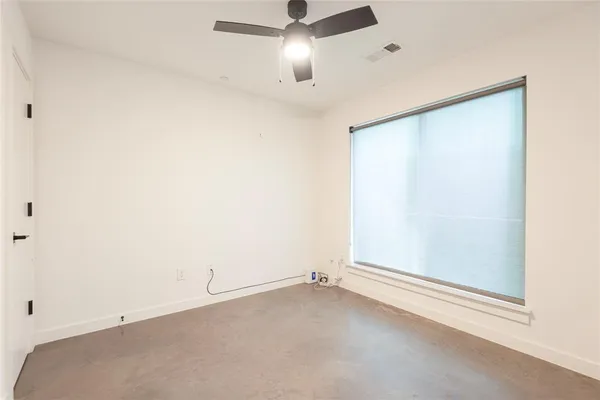 an empty room with a window