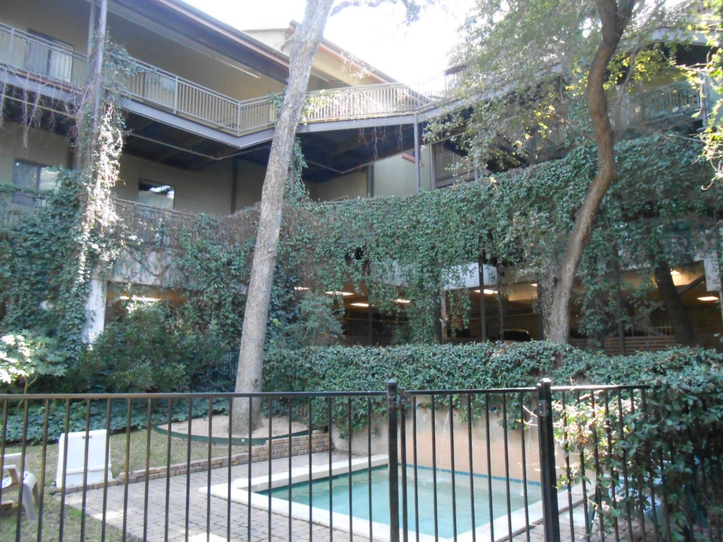 a view of a lake from a balcony