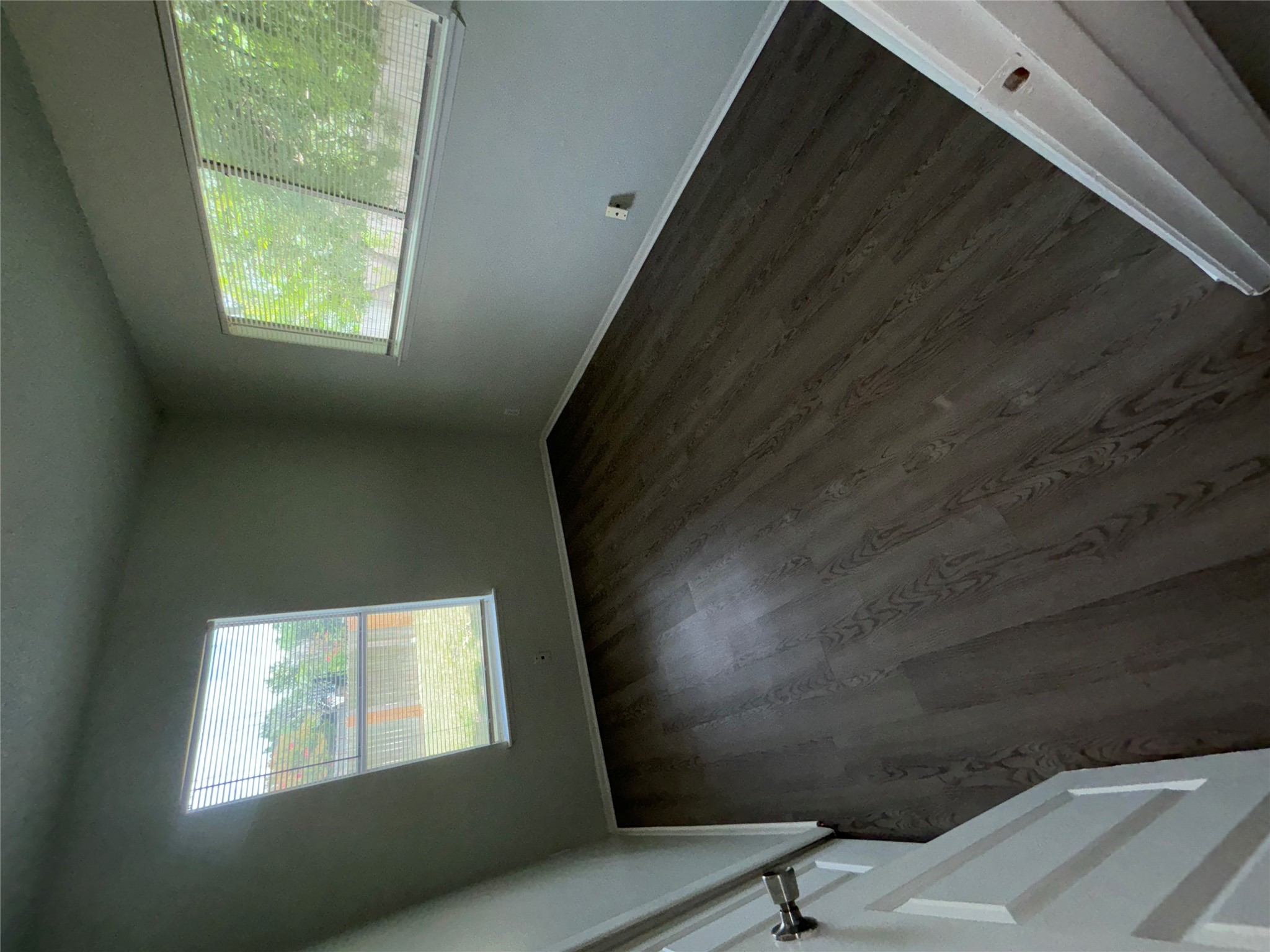 5905 Cherry Loop Austin, TX 78745 - Photo 10 of 13 Newly installed wood-look flooring enhances this well-lit room, ready for your personal touch.