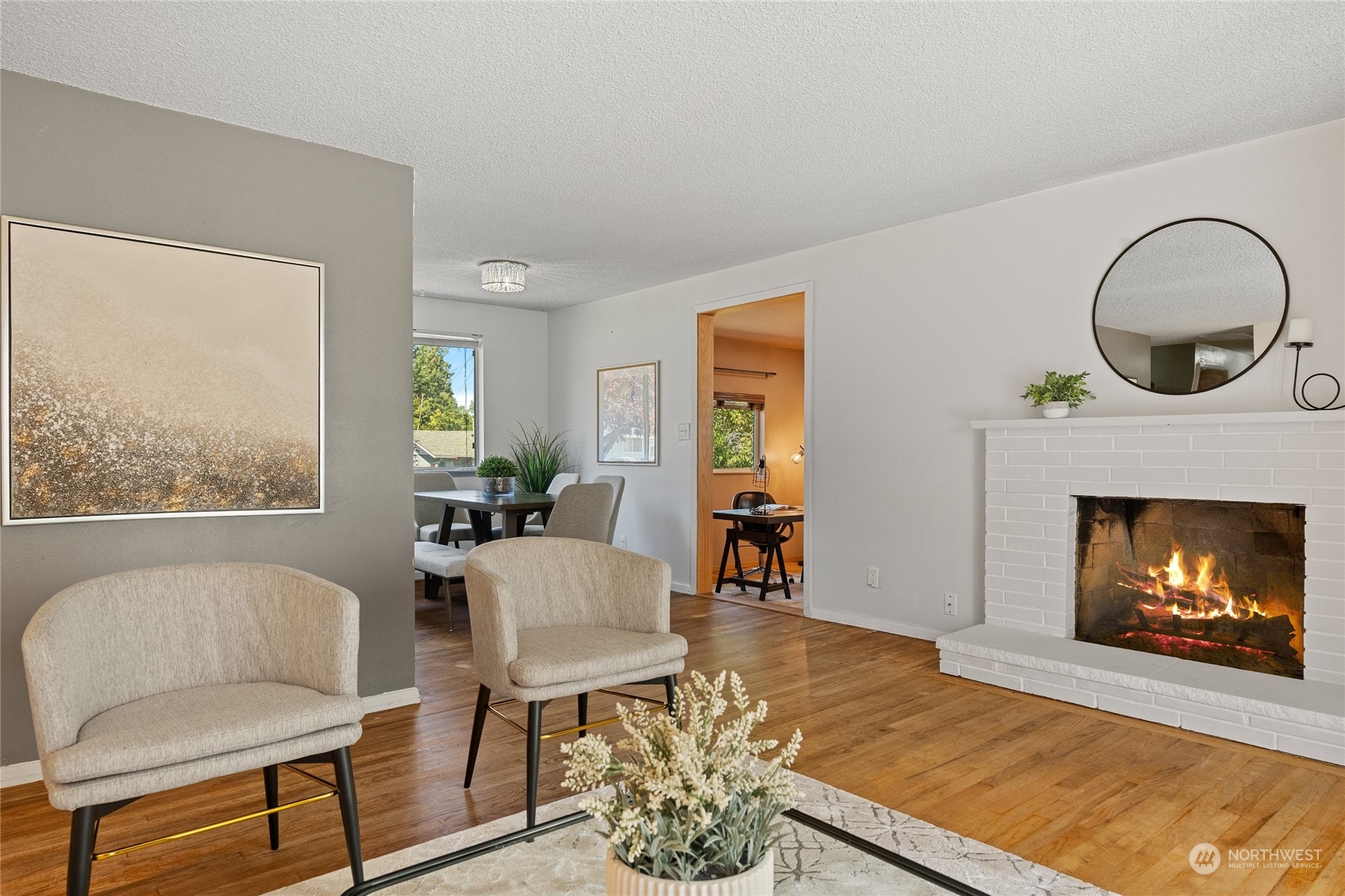 7623 Tyee Road Everett, WA 98203 - Photo 13 of 37 a living room with furniture and a fireplace