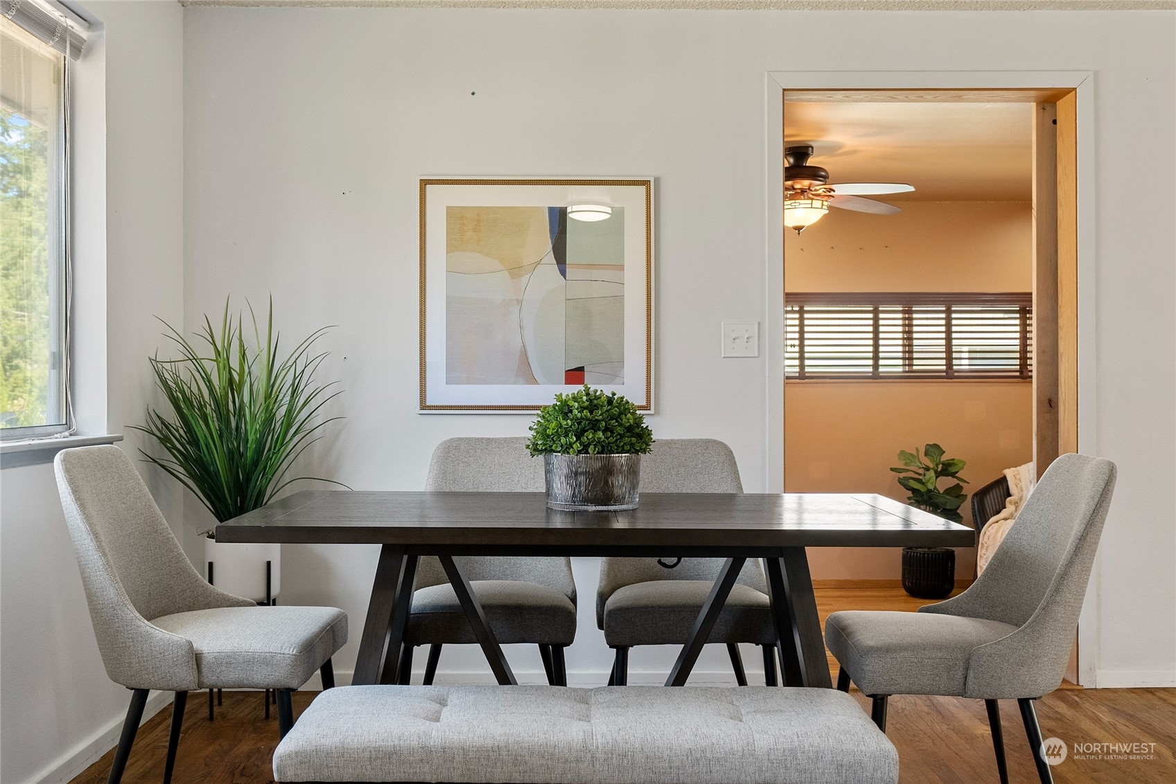 7623 Tyee Road Everett, WA 98203 - Photo 19 of 37 a dining room with furniture and wooden floor