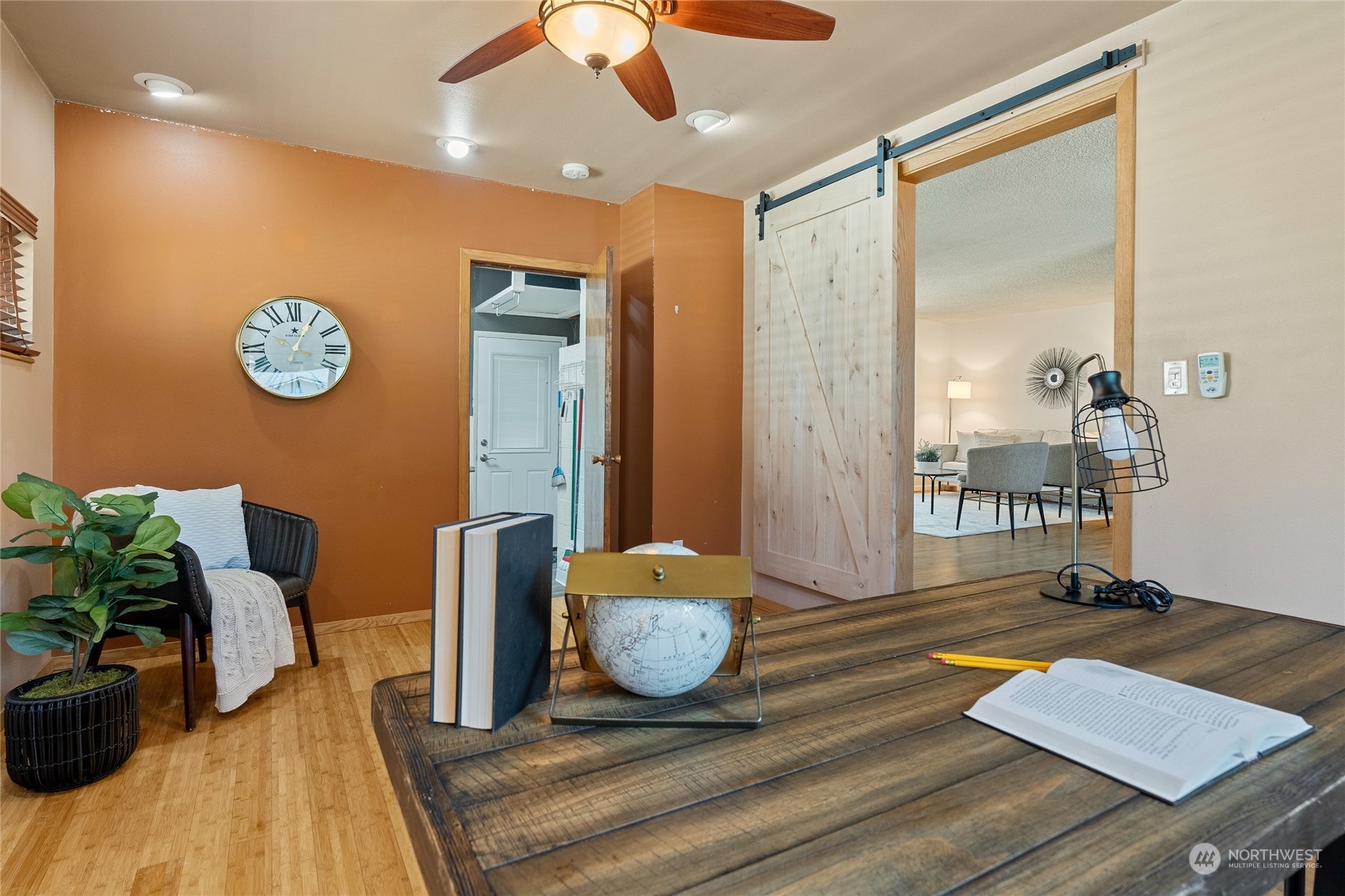 7623 Tyee Road Everett, WA 98203 - Photo 22 of 37 a living room with furniture and wooden floor