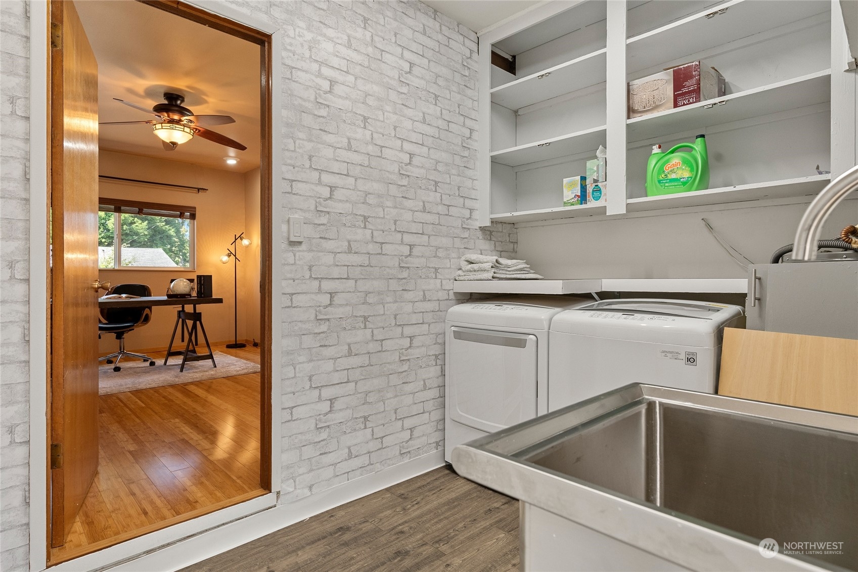 7623 Tyee Road Everett, WA 98203 - Photo 23 of 37 a kitchen with a sink and cabinets