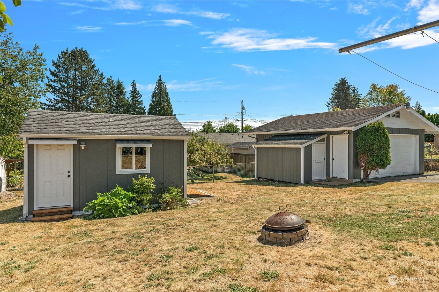 7623 Tyee Road Everett, WA 98203 - Photo 31 of 37 a front view of a house with a yard