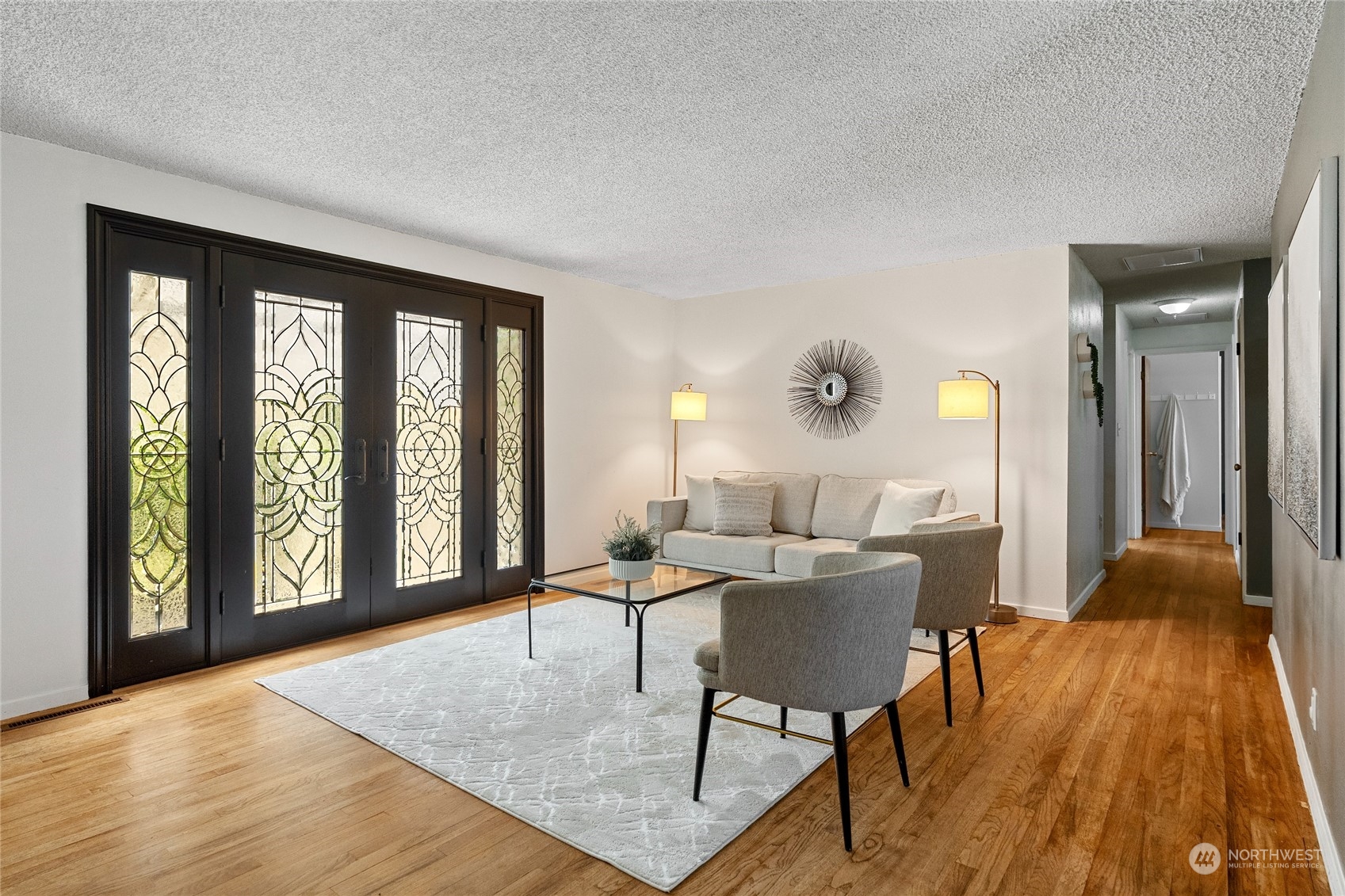 7623 Tyee Road Everett, WA 98203 - Photo 7 of 37 a living room with furniture and a large window