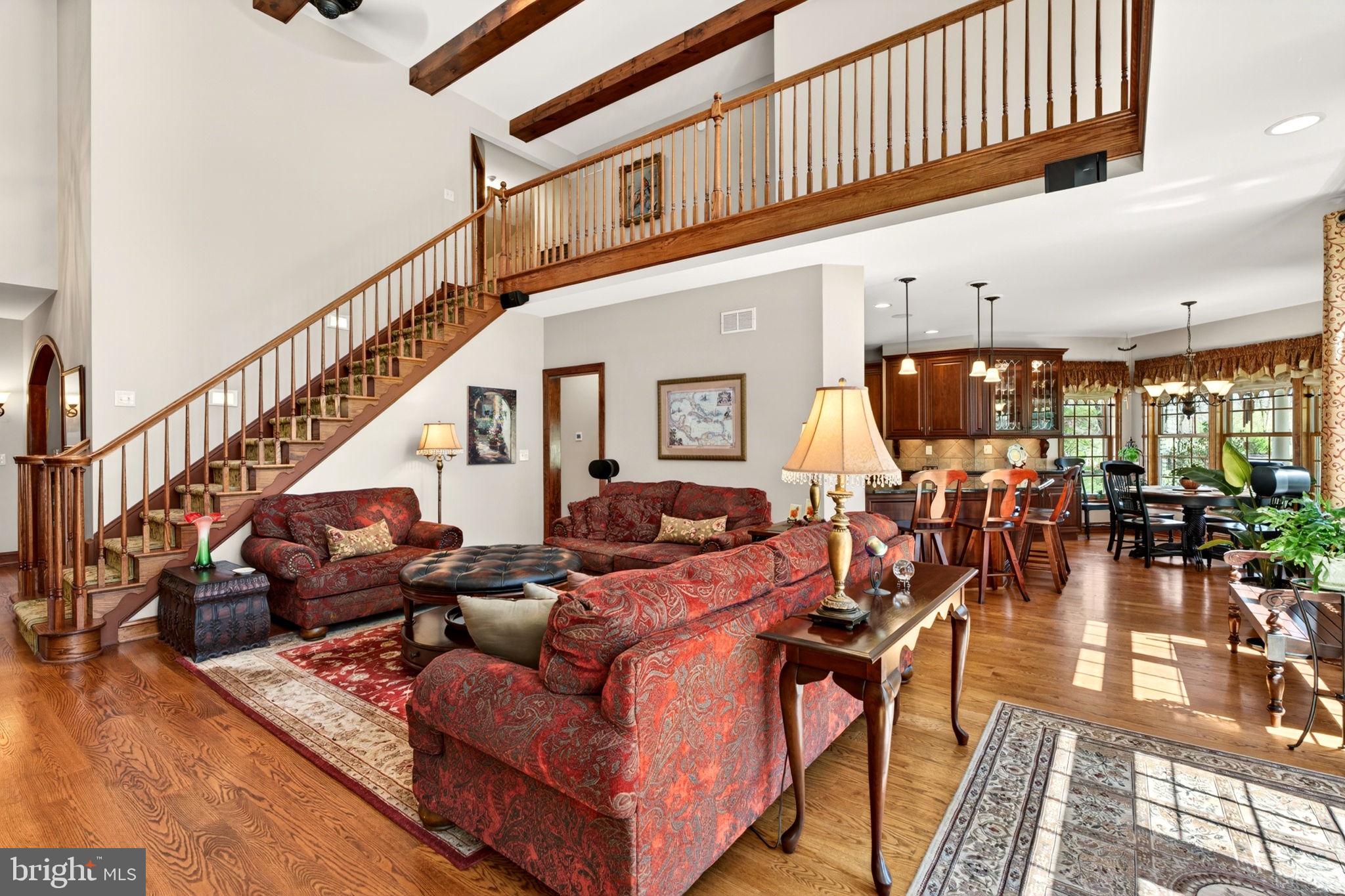 3814 Rocks Station Road Street, MD 21154 - Photo 20 of 70 a living room with lots of furniture and a rug