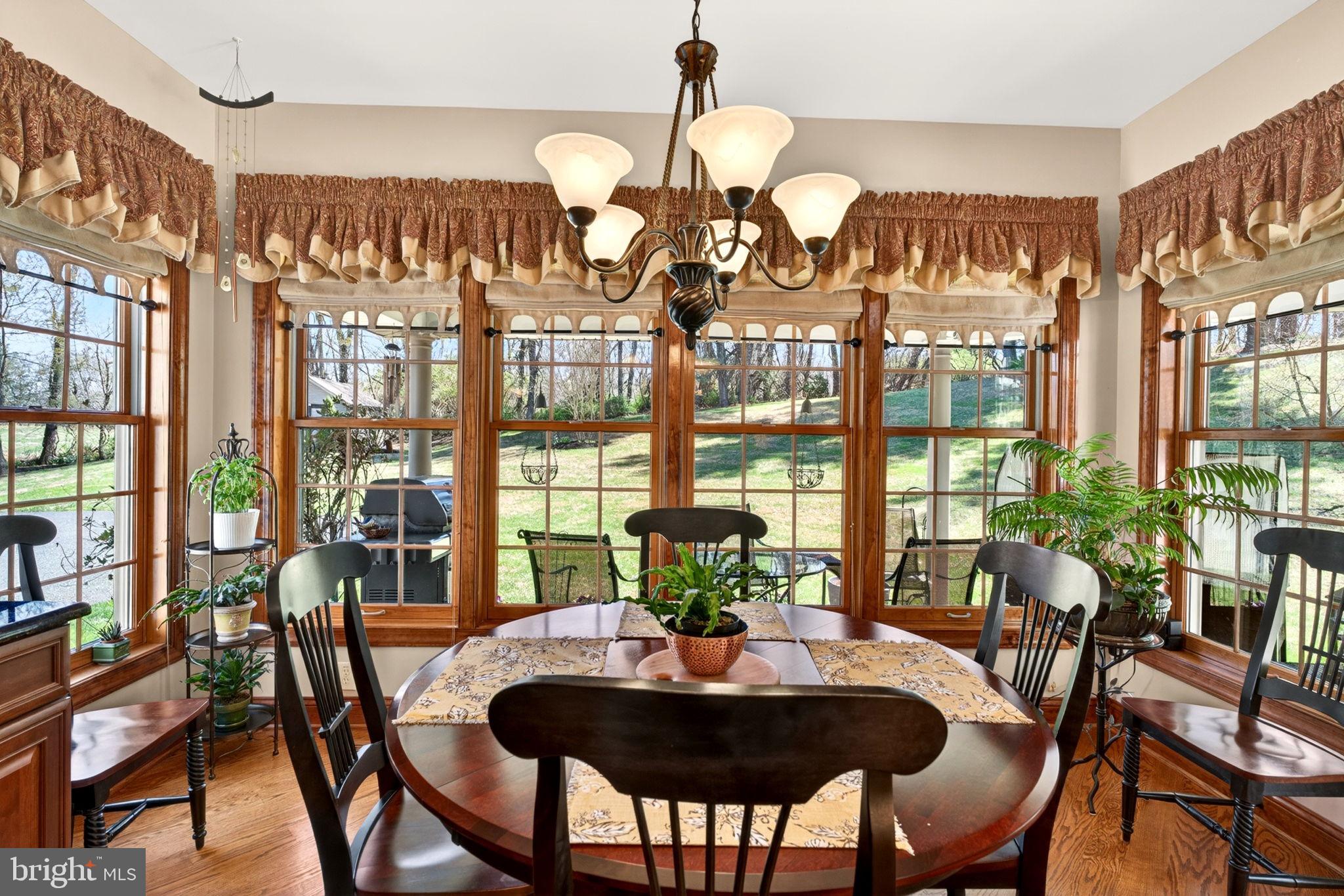 3814 Rocks Station Road Street, MD 21154 - Photo 31 of 70 a view of a dining room with furniture window and wooden floor