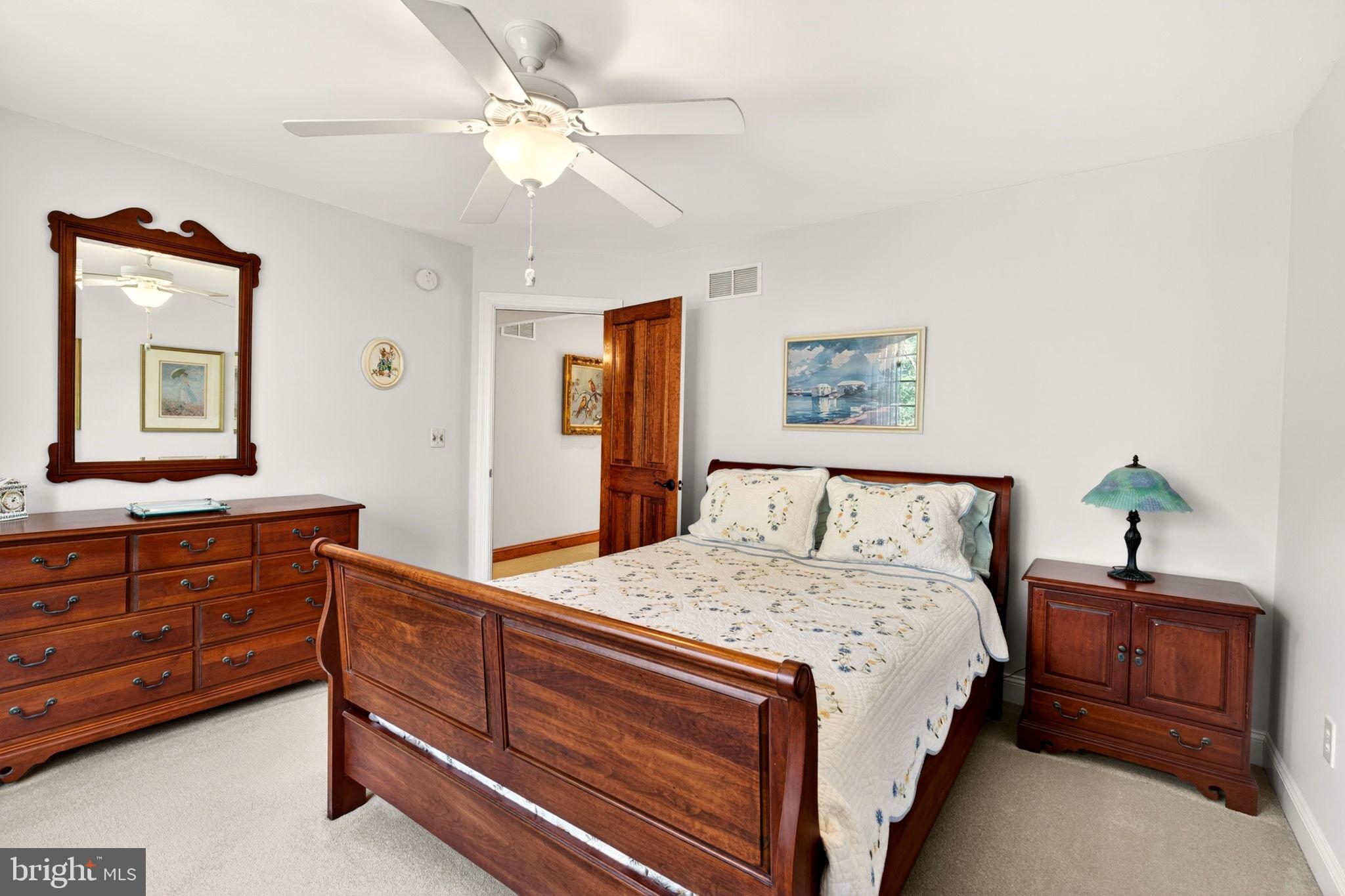 3814 Rocks Station Road Street, MD 21154 - Photo 51 of 70 a bedroom with a bed and a dresser
