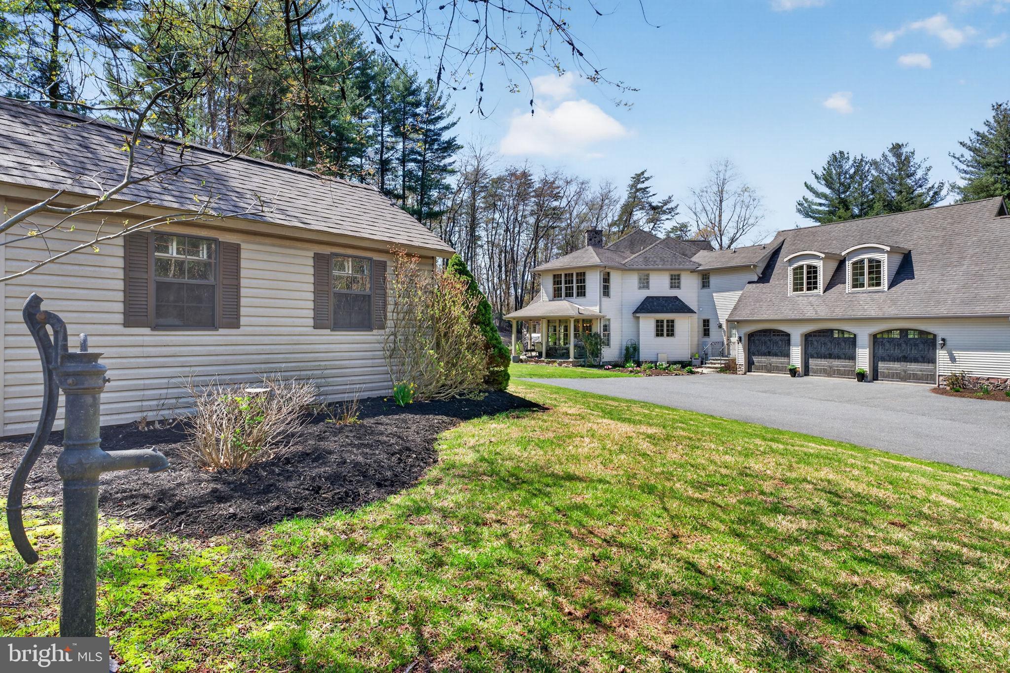 3814 Rocks Station Road Street, MD 21154 - Photo 62 of 70 a front view of a house with garden