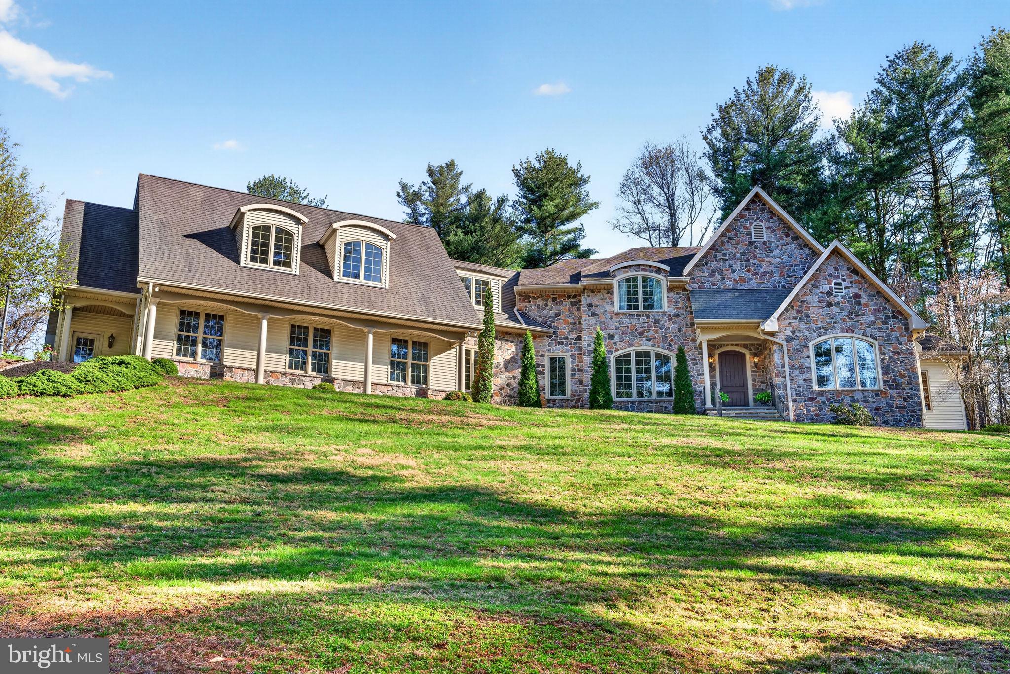 3814 Rocks Station Road Street, MD 21154 - Photo 65 of 70 a front view of a house with a garden
