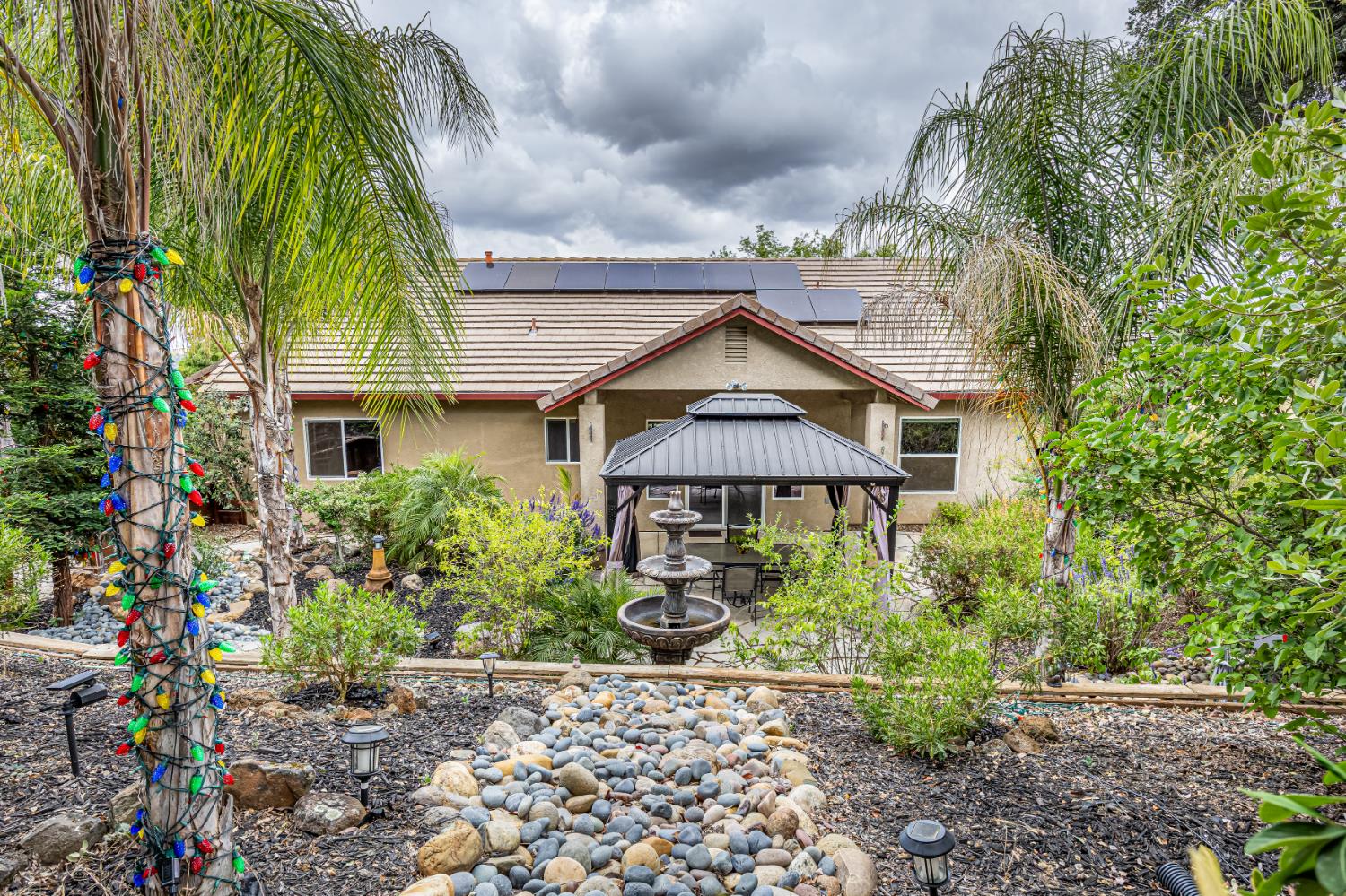 2083 State Rte 26 Valley Springs, CA 95252 - Photo 34 of 59 a front view of a house with a yard