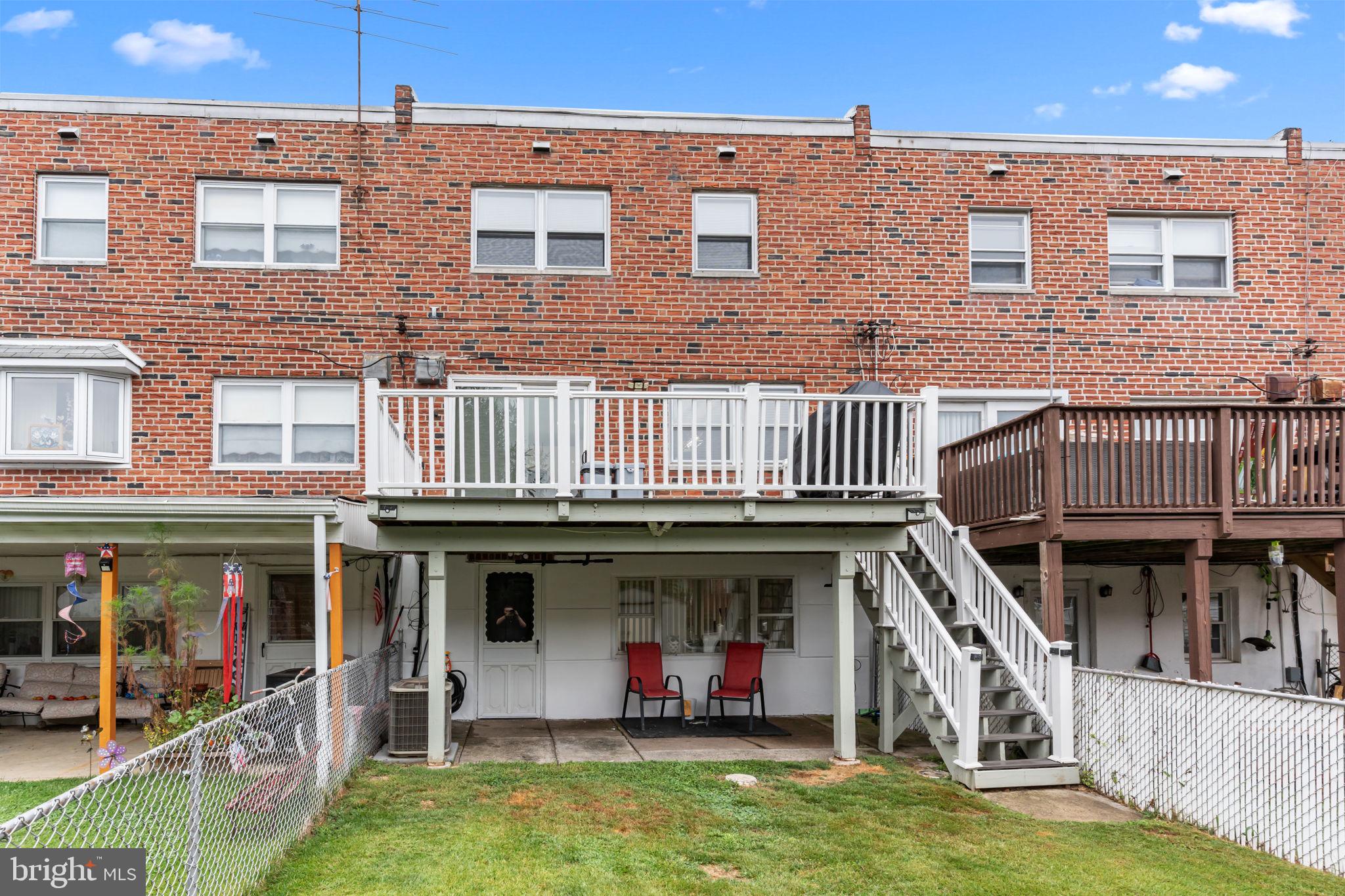 12705 Medford Road Philadelphia, PA 19154 - Photo 29 of 29 a view of building with an entryway and a yard