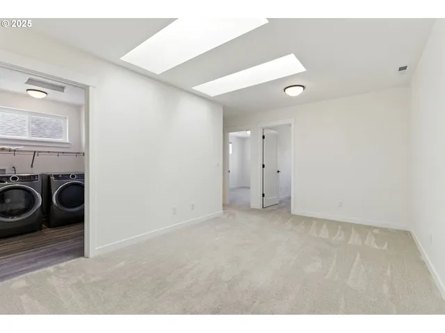 a view of a utility room with washer and dryer