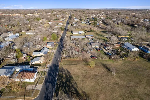 an aerial view of residential house and space
