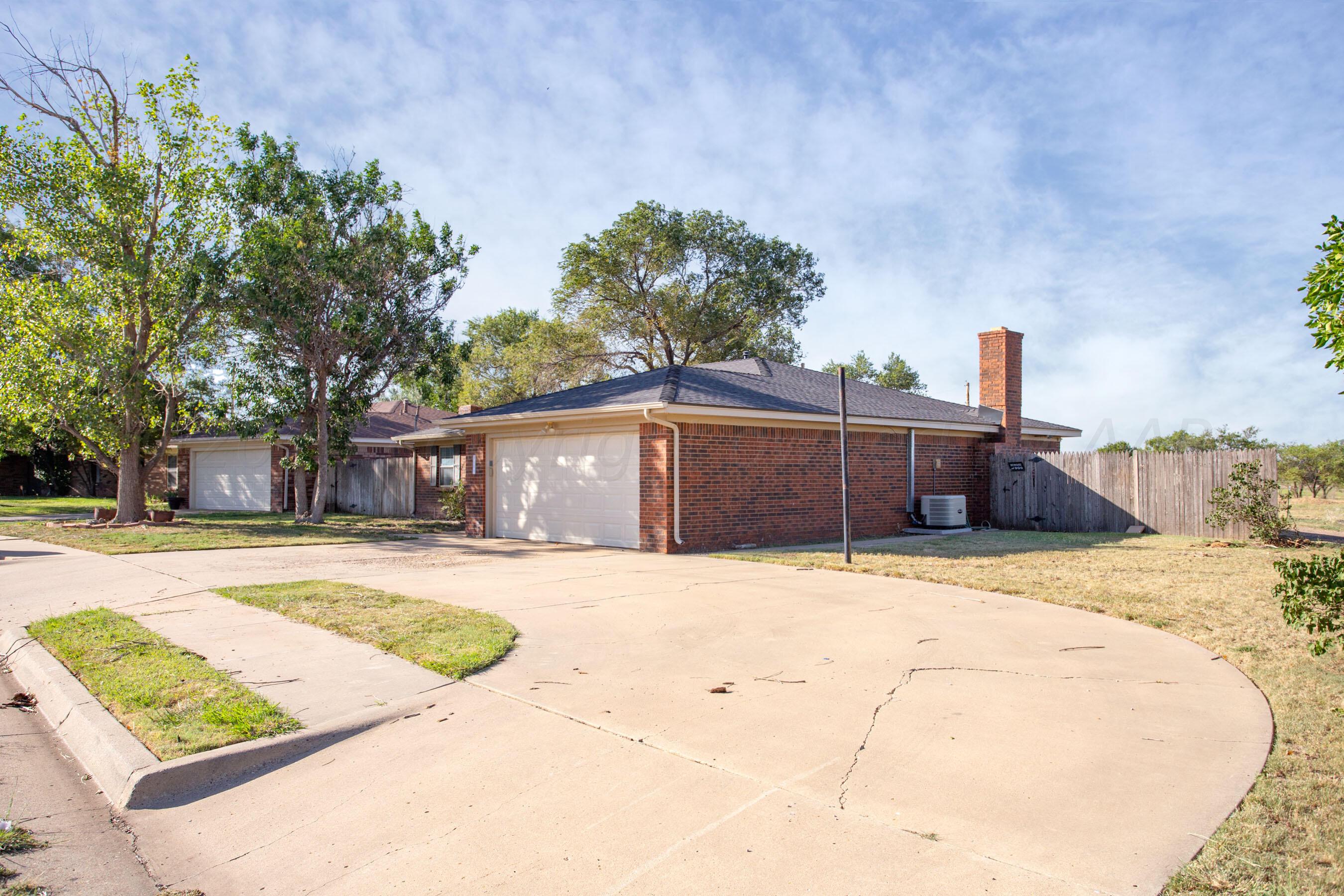 5109 Navajo Trail Amarillo, TX 79110 - Photo 2 of 29 a view of a backyard of the house