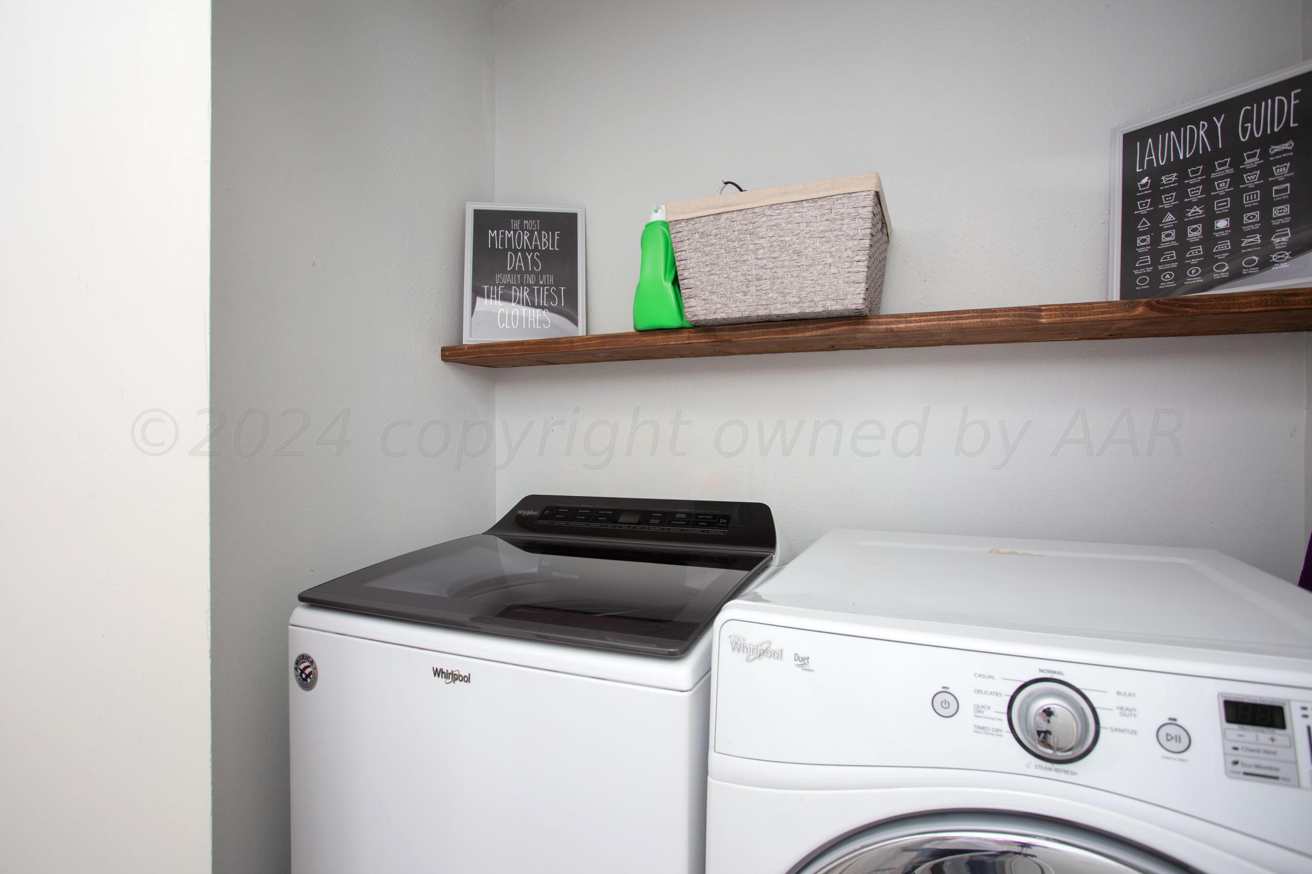 5109 Navajo Trail Amarillo, TX 79110 - Photo 25 of 29 a utility room with dryer and washer