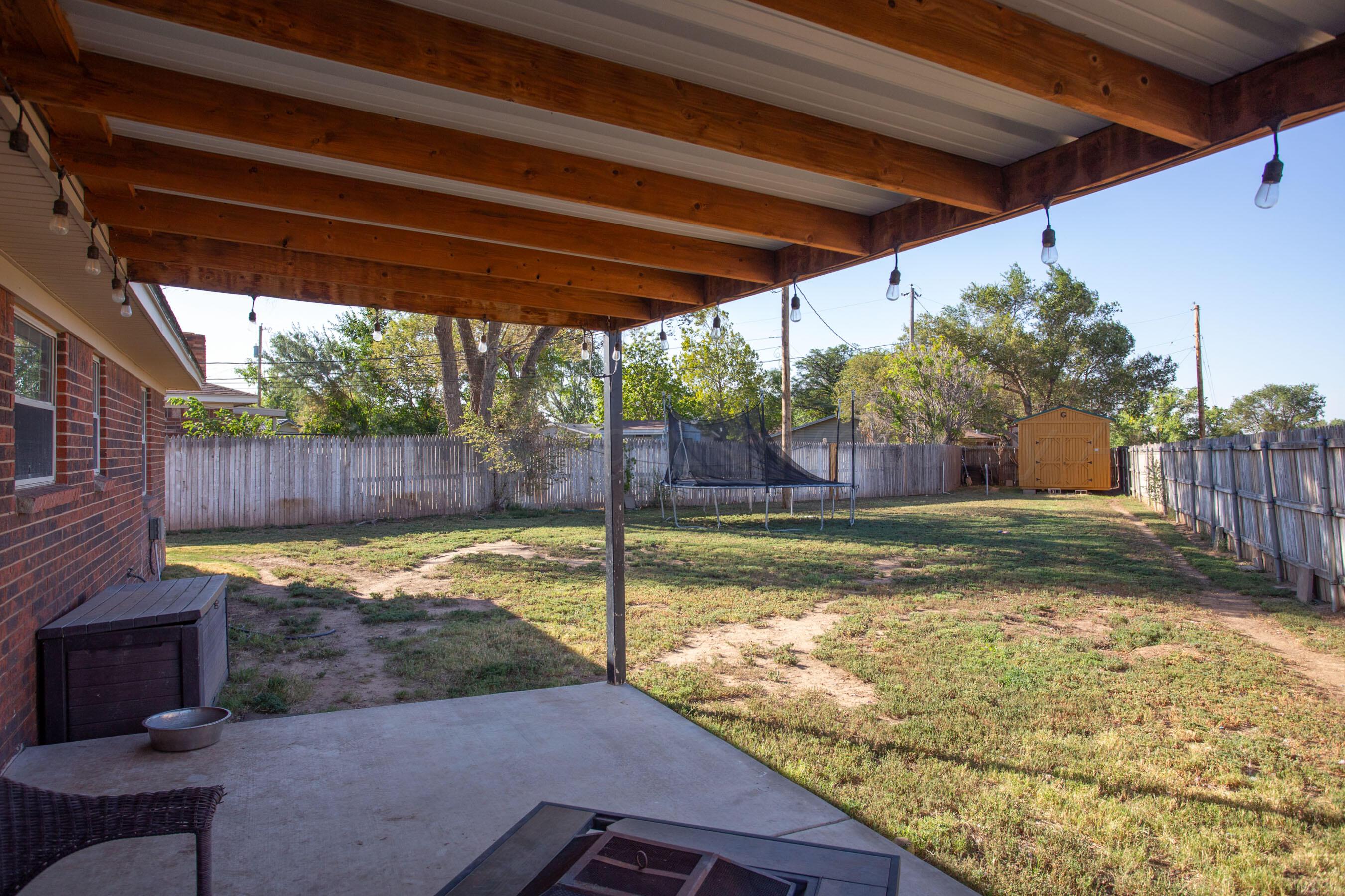 5109 Navajo Trail Amarillo, TX 79110 - Photo 26 of 29 a view of a backyard with swimming pool