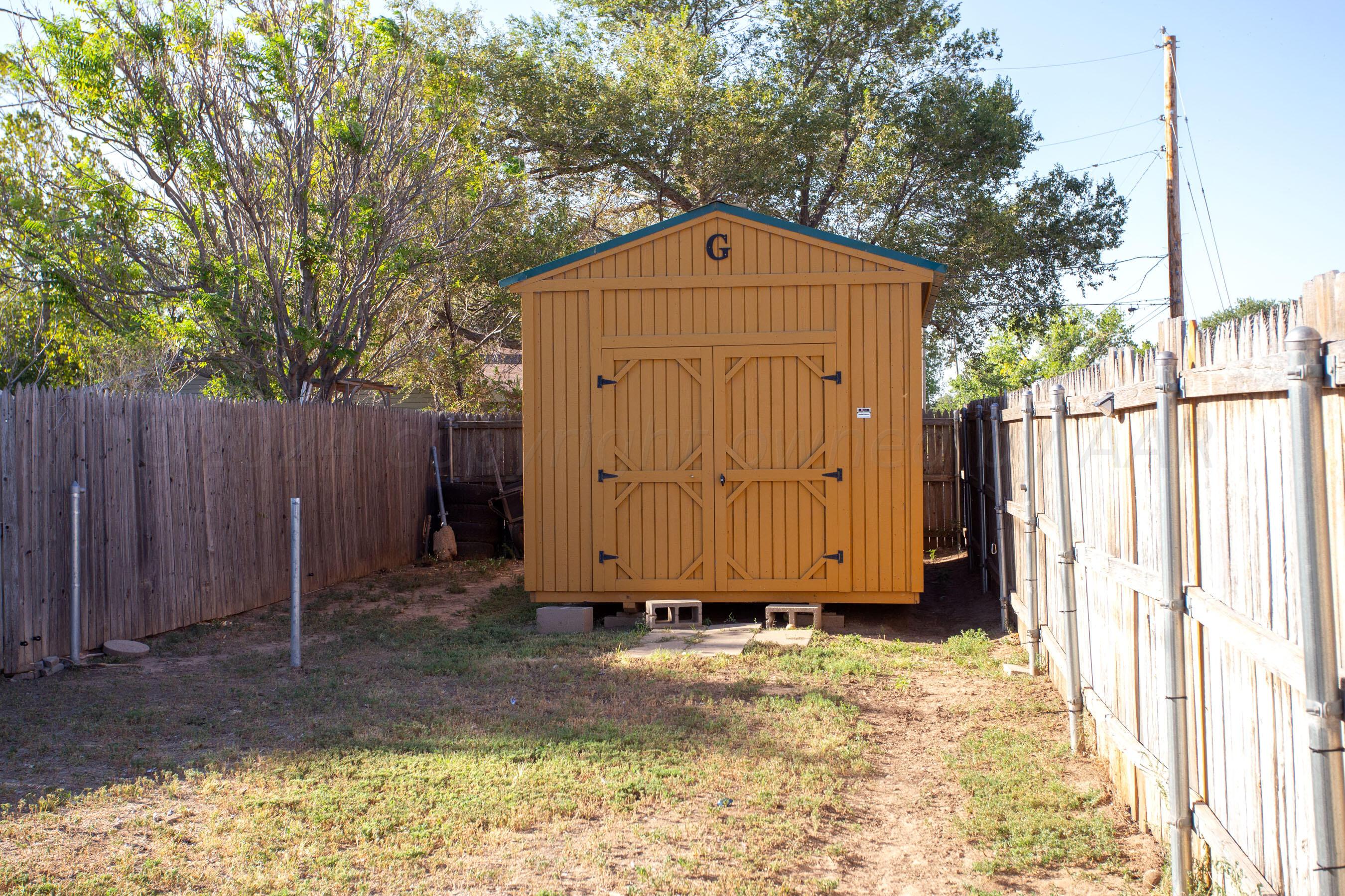 5109 Navajo Trail Amarillo, TX 79110 - Photo 28 of 29 a front view of a house with a yard