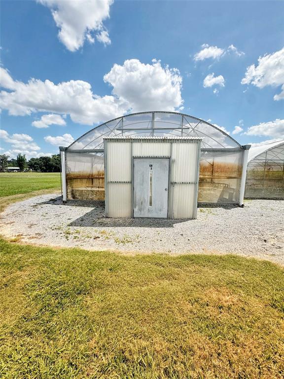 612 Morgan Road Winter Haven, FL 33880 - Photo 23 of 38 a view of a house with a yard