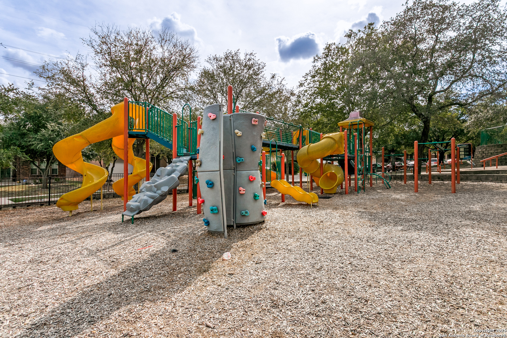 6609 Wood Bench Live Oak, TX 78233 - Photo 22 of 23 a view of outdoor space with playground and green space