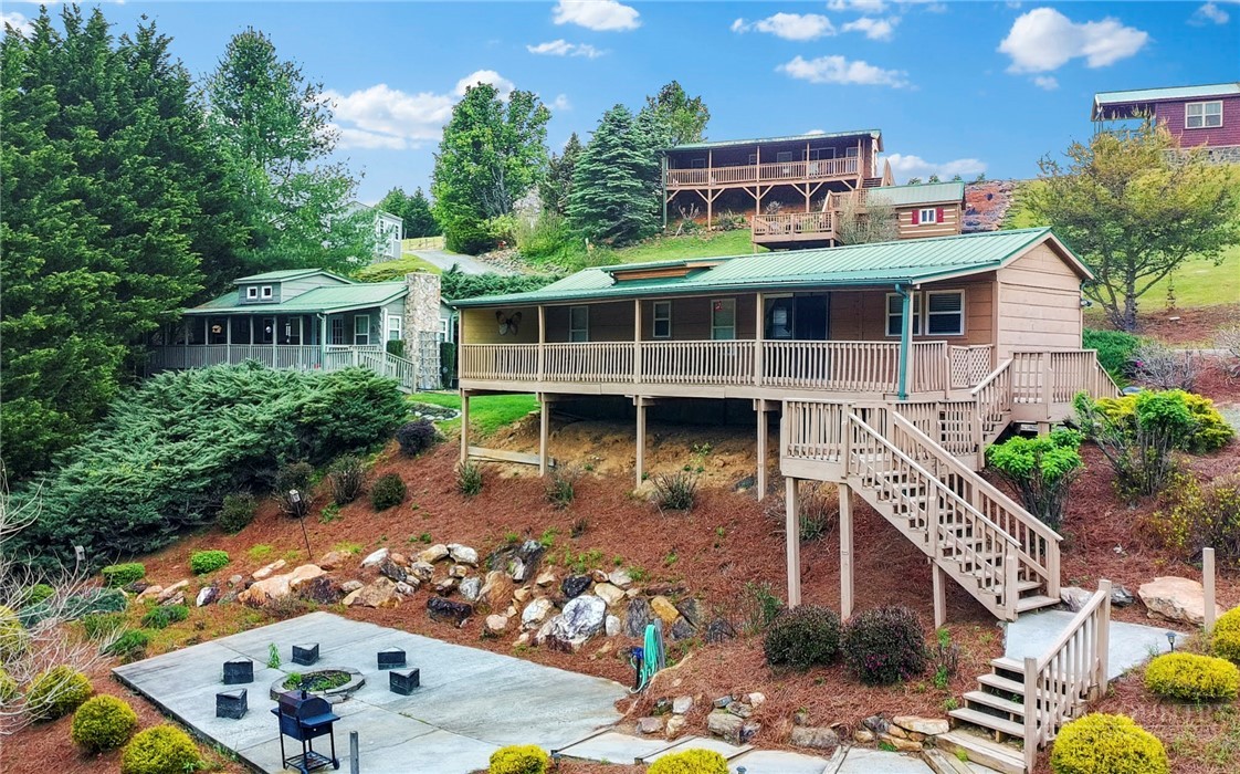 aerial view of a house with a yard