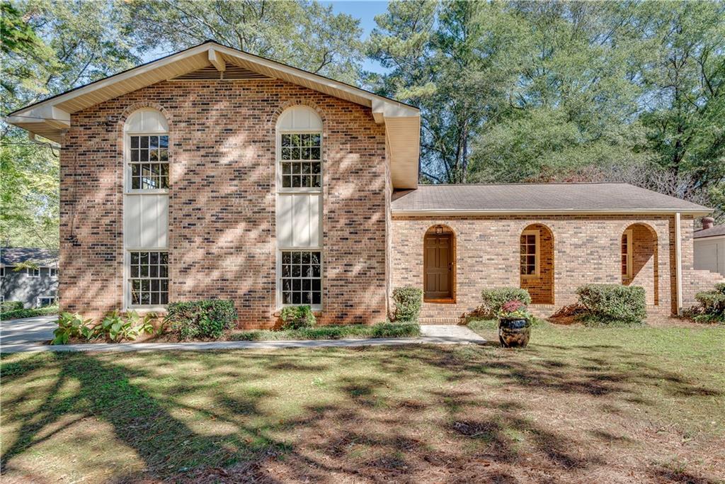 1569 Coolwater Court Decatur, GA 30033 - Photo 1 of 1 a view of a house with yard and plants