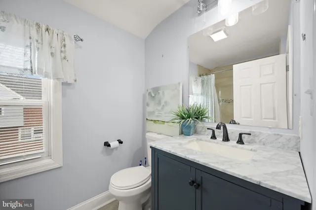 a view of an empty room with stairs