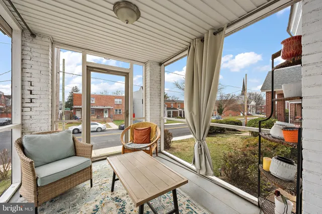 a living room with furniture fireplace and a flat screen tv
