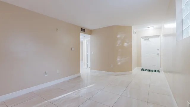 a view of a bathroom with a washer and dryer