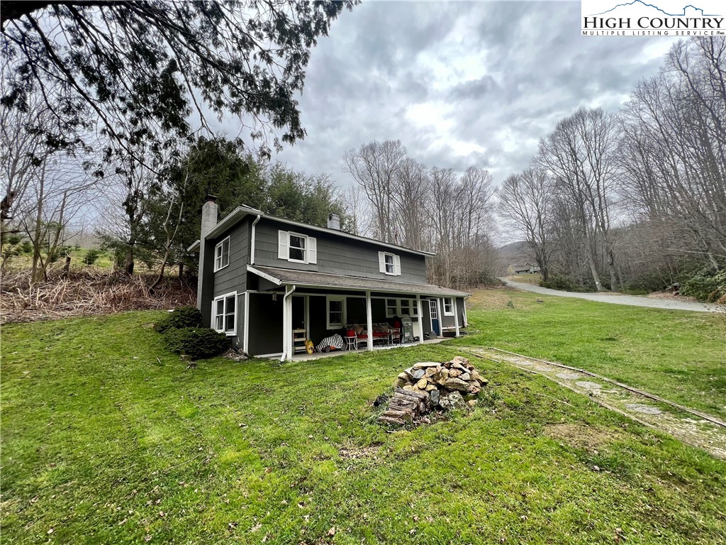 2601 Mountaindale Road Vilas, NC 28692 - Photo 1 of 14 front view of a house with a big yard