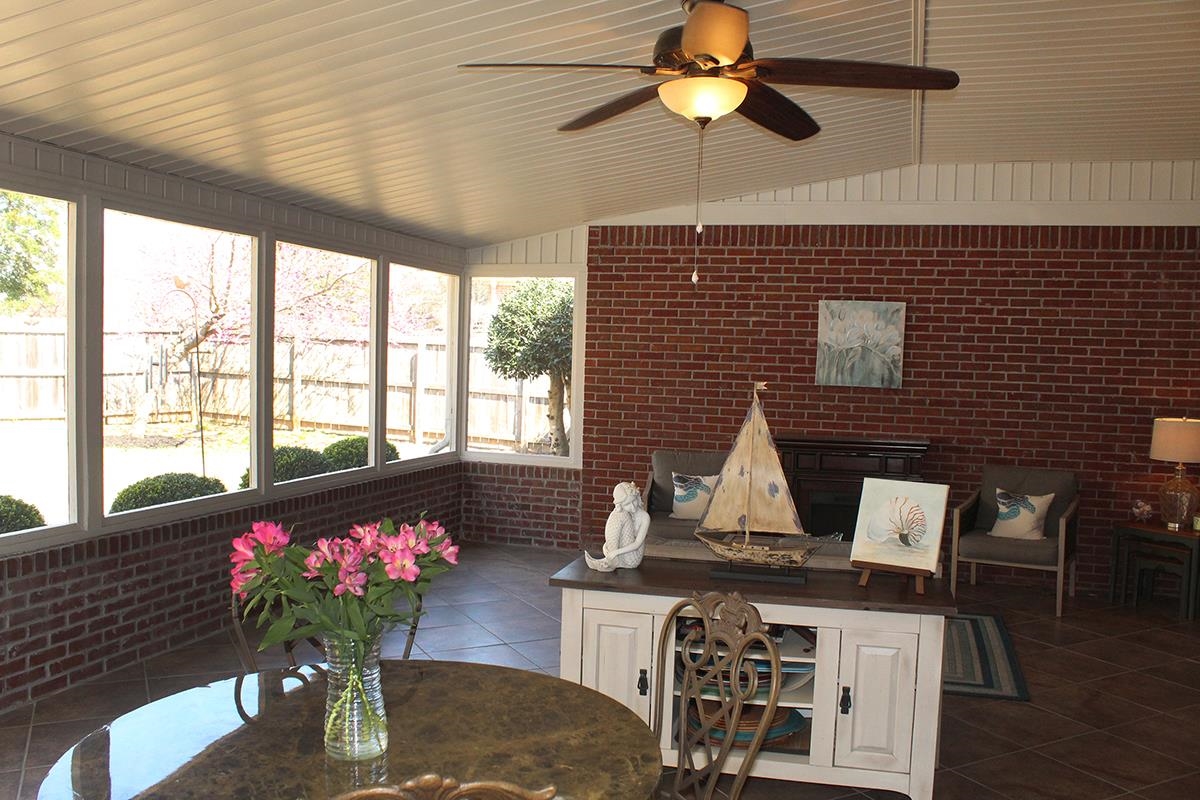 175 Windale Drive Jackson, TN 38305 - Photo 12 of 25 Sunroom / solarium featuring ceiling fan, lofted ceiling, and outdoor dining area