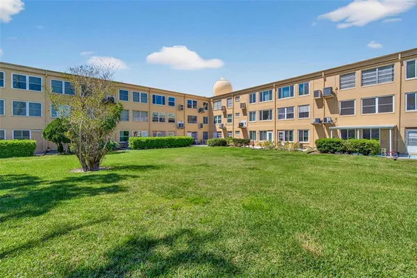 a garden view with a sitting space