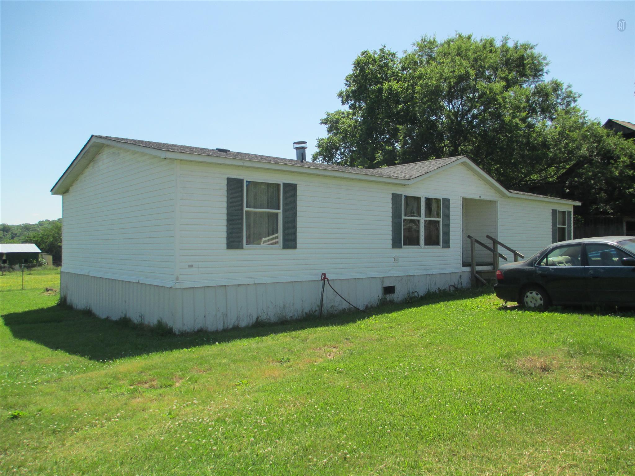 832 Roberts Road Watertown, TN 37184 - Photo 9 of 20 a front view of a house with a garden
