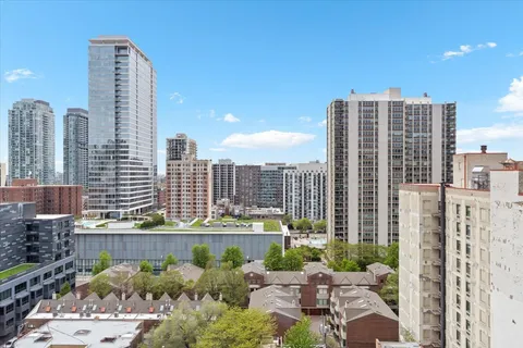 a view of a city with tall buildings