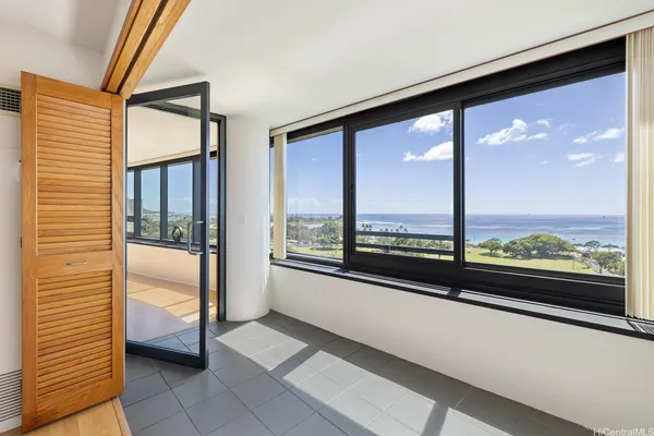 a view of an empty room and window