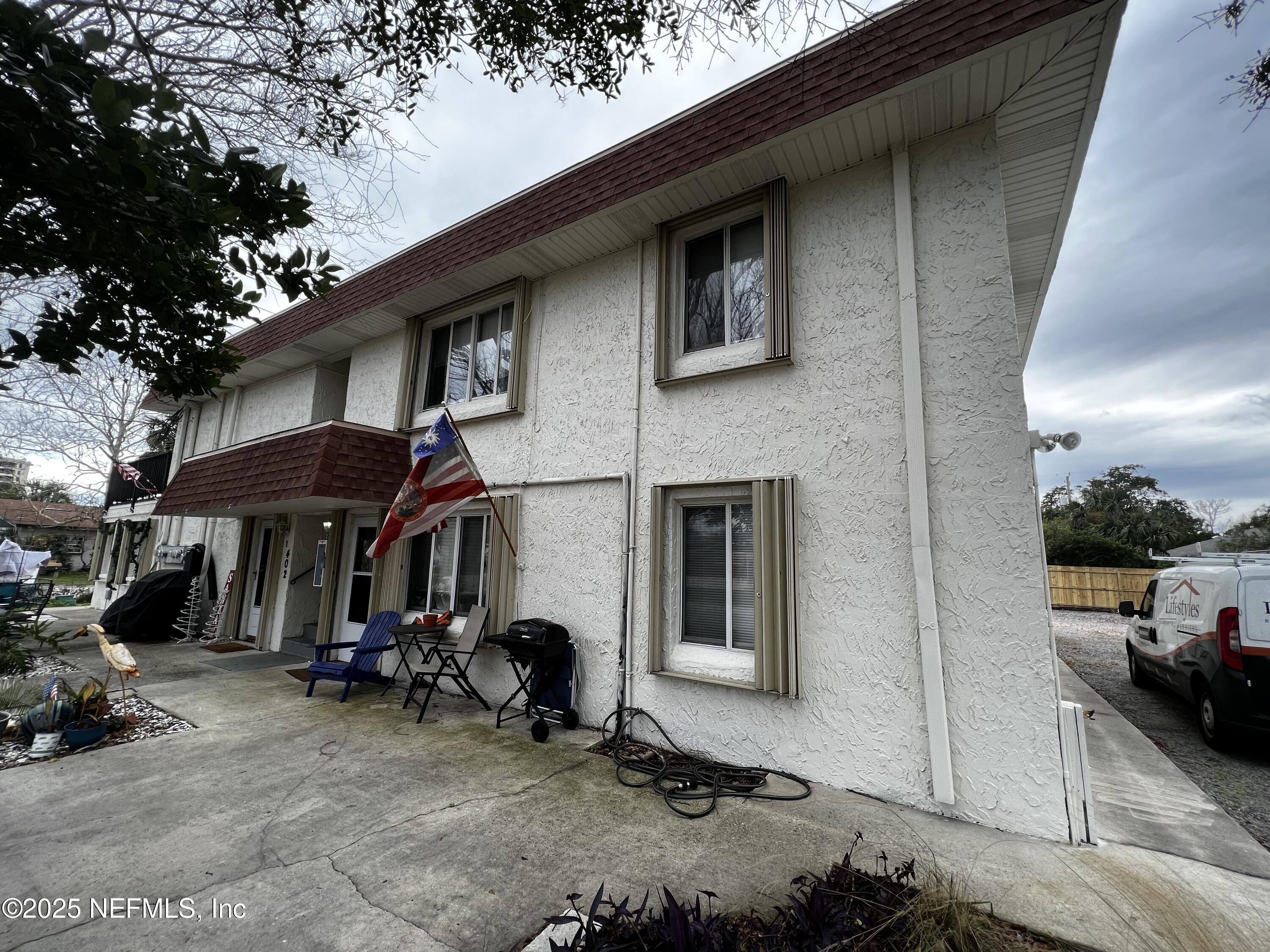 a view of a car park in front of a building
