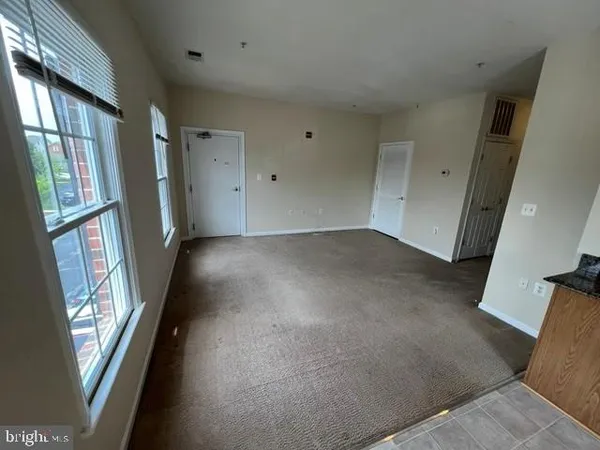 a view of a room with a hallway