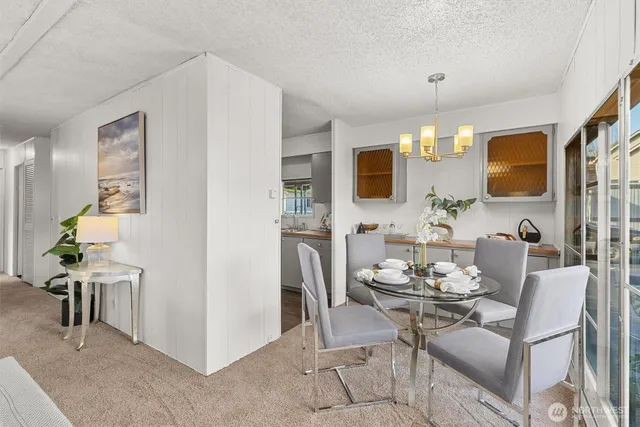 a view of a dining room with furniture