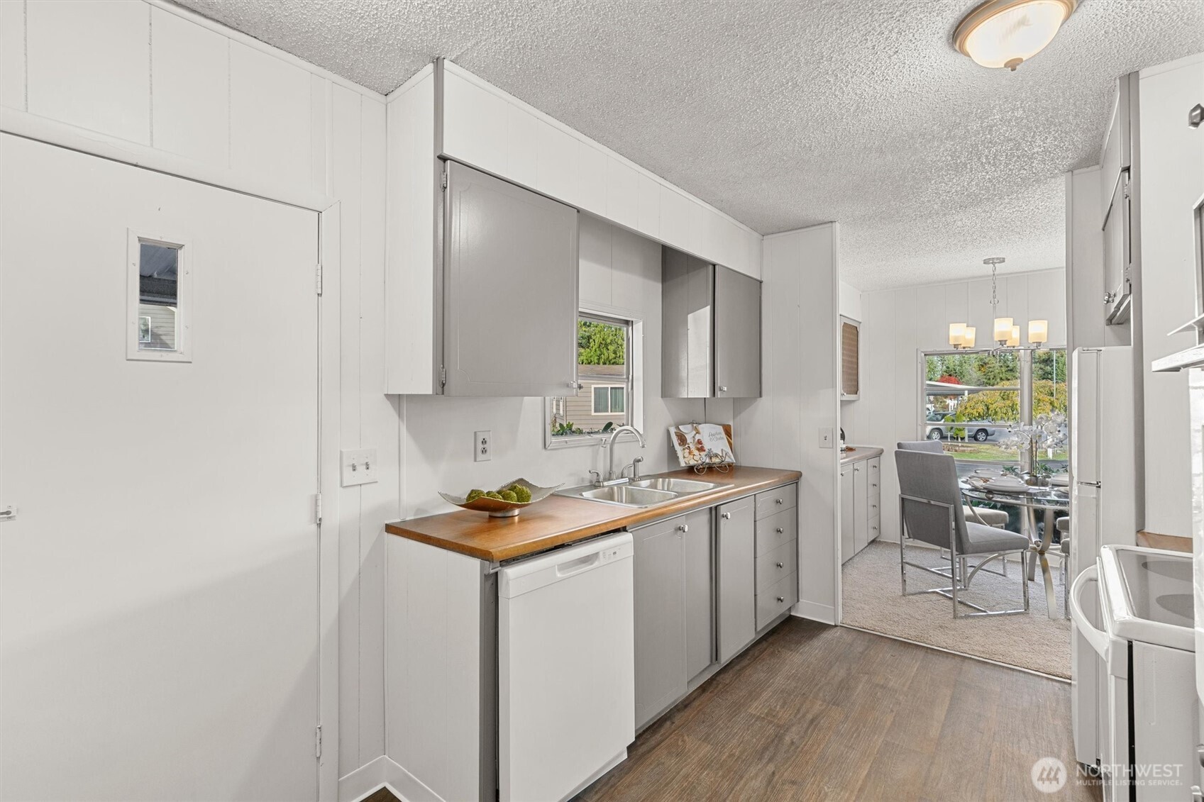 11622 Silver Lake Road, Unit 71 Everett, WA 98208 - Photo 16 of 35 a kitchen with a sink cabinets and counter space