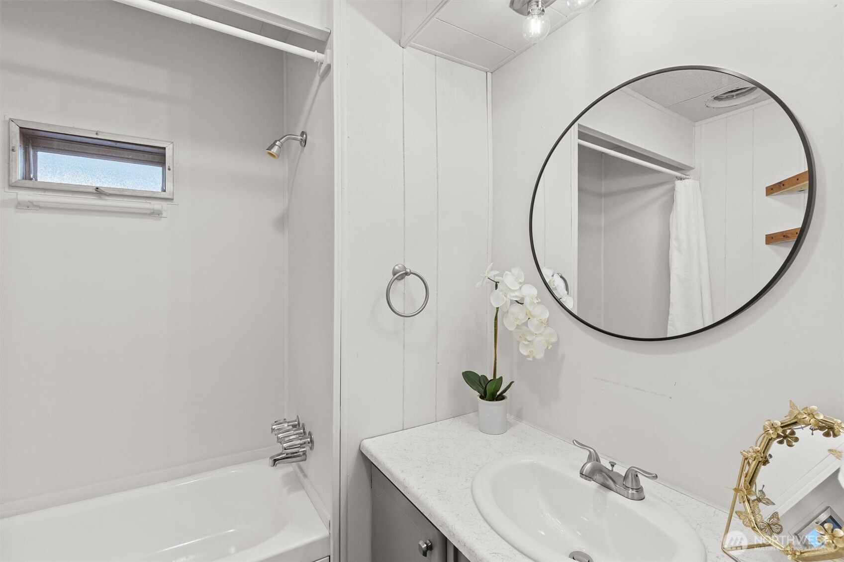 11622 Silver Lake Road, Unit 71 Everett, WA 98208 - Photo 18 of 35 a bathroom with a sink and a mirror