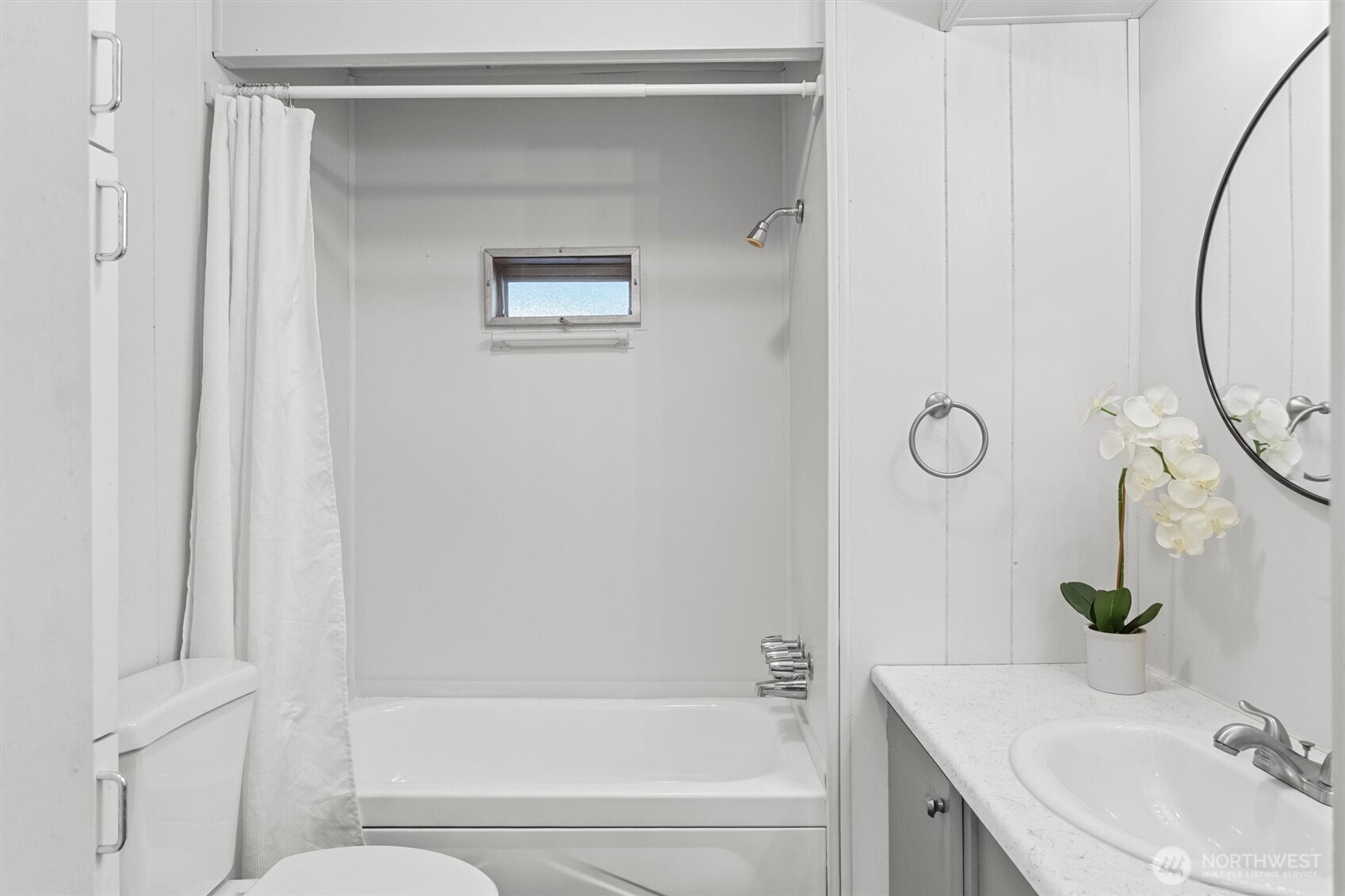 11622 Silver Lake Road, Unit 71 Everett, WA 98208 - Photo 19 of 35 a bathroom with a granite countertop sink and a mirror