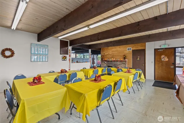 a dining room with furniture and a table