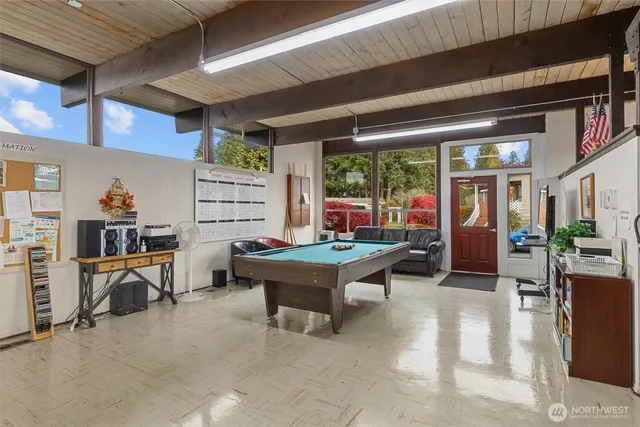 a room with furniture and a large window