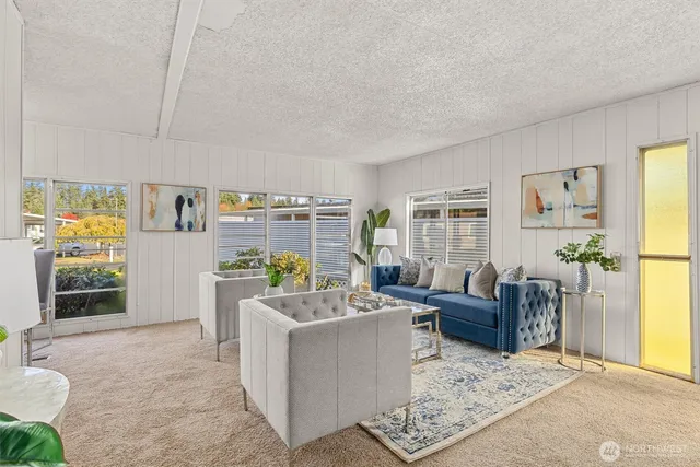 a living room with furniture and a couch