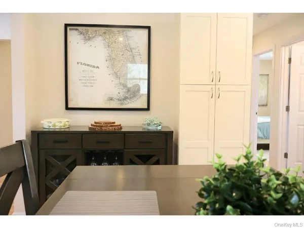 a view of a living room with a large window